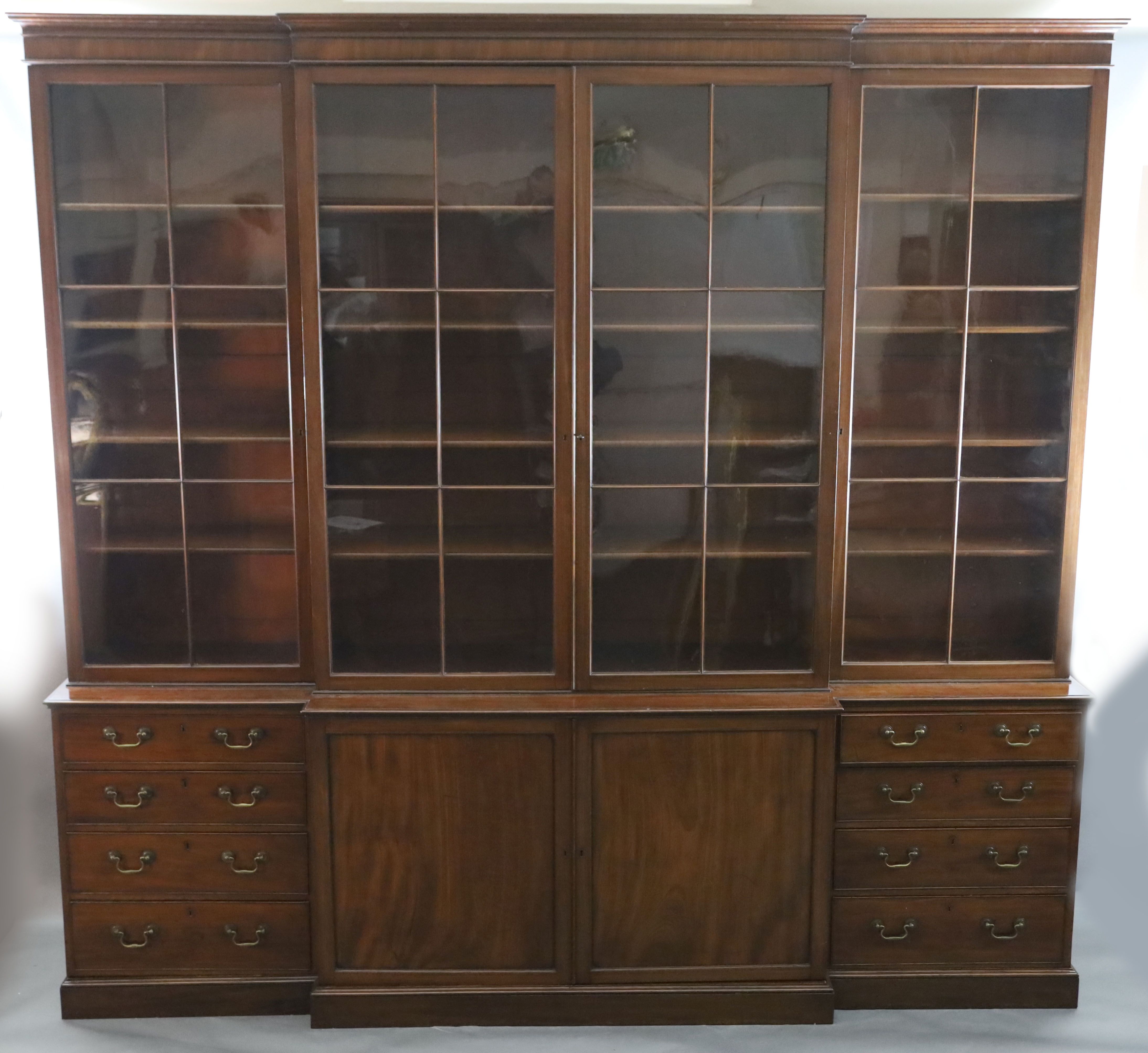 A George III mahogany breakfront library bookcase, W.11ft 5in. D.1ft 10in. H.9ft